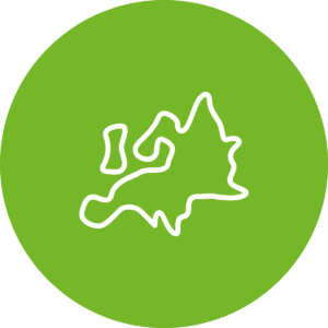 Grüne Kreisfläche mit weißer Umrisslinie einer Landkarte.