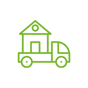 Grünes Icon eines Hauses auf einem Lastwagen vor weißem Hintergrund.